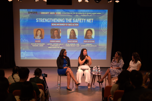 Viviene Sandhu, Clifford Law LLP and Pro Bono SG Ambassador for 2025; Faith Joyce Koh, a community intervention advocate; Grace Arthur, a social worker with Care Corner Project StART; and Li Li Tey, AWARE’s Helpline Programme Manager; talking about how to report domestic violence at IDEVAW 2024. Photograph by Bernadette Xiao (@bernadette.xiao on Instagram).